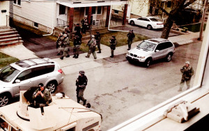 An example of a public servant pointing a loaded weapon at a tax payer in Boston.