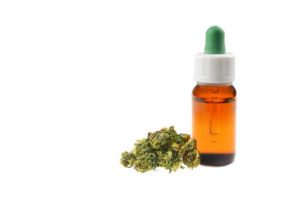 Marijuana oil cbd bottle isolated on white background